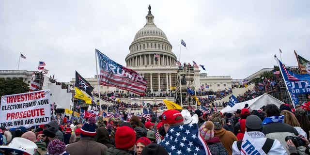 Rioters loyal to then-President Trump demonstrate at the US Capitol in Washington on January 6, 2021.