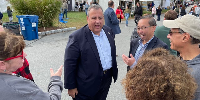 Former New Jersey Gov. Chris Christie, a 2016 Republican presidential candidate, campaigns with Allan Fung, the GOP nominee in Rhode Island's 2nd Congressional District, in North Scituate, R.I. on Oct. 10, 2022