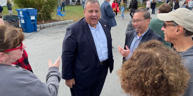 Former New Jersey Gov. Chris Christie, a 2016 Republican presidential candidate, campaigns with Allan Fung, the GOP nominee in Rhode Island's 2nd Congressional District, in North Scituate, R.I. on Oct. 10, 2022