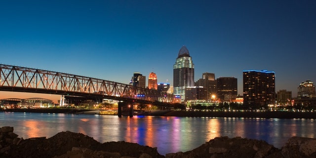 A nighttime view of the Cincinnati, Ohio skyline.