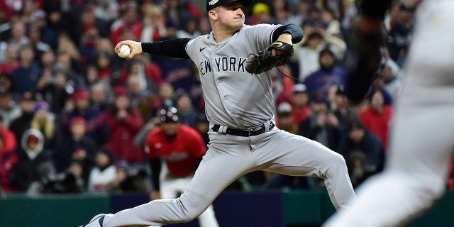 New York Yankees' Clarke Schmidt pitches in the ninth inning of Game 3 of the baseball team's AL Division Series against the Cleveland Guardians, Saturday, Oct. 15, 2022, in Cleveland.