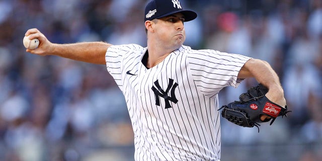 Clay Holmes, #35 of the New York Yankees, pitches during the ninth inning against the Cleveland Guardians in game two of the American League Division Series at Yankee Stadium on October 14, 2022, in New York, New York.