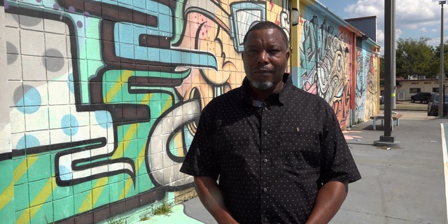 Detrick Saulter stands outside Lester Community Center where the Memphis activist often hosts events for community members and law enforcement through his organization, F.A.T.H.E.R.S.