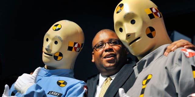 The Vince and Larry crash test dummy public service campaign was launched in 1985. Donated artifacts were welcomed at a ceremony at the Smithsonian American History museum on July, 14, 2010, in Washington, DC., where NHTSA Administrator David Strickland (above, center) posed for pictures with the original crash test dummies. 