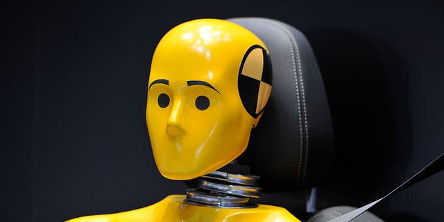 A crash test dummy is displayed during the Geneva Motor Show 2016 on March 2, 2016, in Geneva, Switzerland.  
