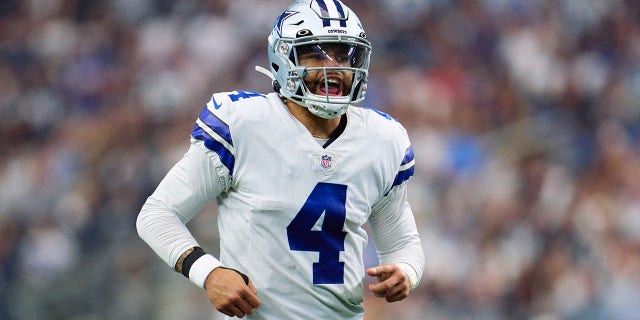 Dak Prescott #4 of the Dallas Cowboys reacts after a play against the Detroit Lions during the second half at AT&T Stadium on October 23, 2022, in Arlington, Texas.