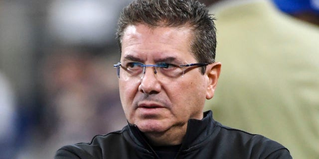 Daniel Snyder watches his team warm up prior to action against the Dallas Cowboys at AT&amp;T Stadium.