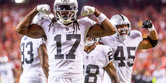 Las Vegas Raiders wide receiver Davante Adams (17) celebrates in the end zone after scoring a touchdown during the first half against the Kansas City Chiefs on October 10th, 2022 at GEHA field in Kansas City, Missouri.