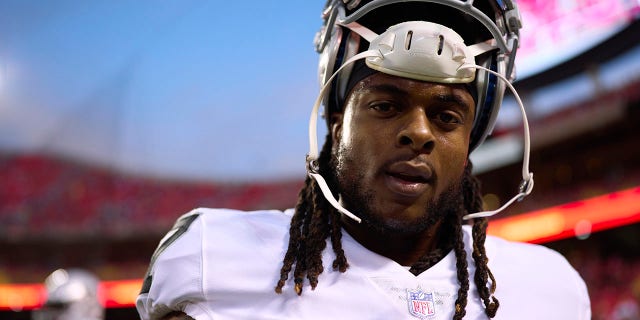 #17 Davante Adams of the Las Vegas Raiders warms up before kickoff against the Kansas City Chiefs at GEHA Field at Arrowhead Stadium in Kansas City, Missouri on October 10, 2022.