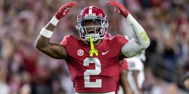 AP Top 25 poll: Shake-up in top spots; James Madison enters rankings for first time 2 Alabama defensive back DeMarcco Hellams cheers after a stop of Texas A and M during the second half of a game Saturday, Oct. 8, 2022, in Tuscaloosa, Ala.