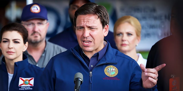 Florida Gov. Ron DeSantis speaks during a press conference to update information about the on ongoing efforts to help people after hurricane Ian passed through the area on Oct. 4, 2022, in Cape Coral, Florida. 