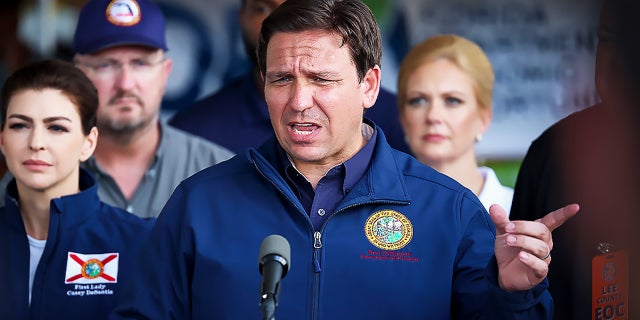 Florida Governor Ron DeSantis speaks during a press conference to update information about the on ongoing efforts to help people after hurricane Ian passed through the area on October 4, 2022 in Cape Coral, Florida. 