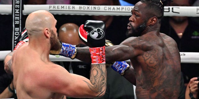 US boxer Deontay Wilder (R) fights Swedish-Finnish boxer Robert Helenius during their 12-round WBC World Heavyweight Title Eliminator fight at Barclays Center in Brooklyn, New York, on October 15, 2022.