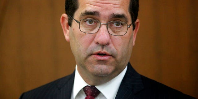 Kansas Attorney General Derek Schmidt, the Republican nominee for governor, answers questions from reporters during a news conference, Tuesday, Oct. 11, 2022, in Topeka, Kan. 