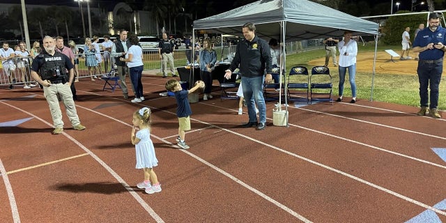 Govenor Ron DeSantis attends a football game at Naples High School just 10 days after Hurricane Ian ravaged the area. 