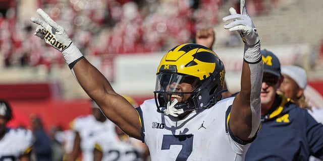 Donovan Edwards, #7 of the Michigan Wolverines, celebrates after the game against the Indiana Hoosiers at Memorial Stadium on Oct. 8, 2022, in Bloomington, Indiana.