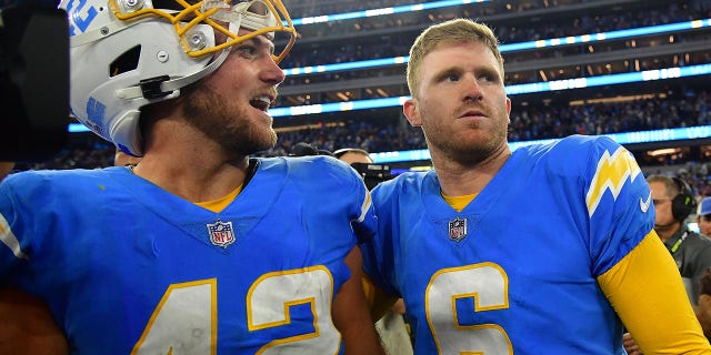 Oct 17, 2022; Inglewood, California, USA; Los Angeles Chargers place kicker Dustin Hopkins (6) and linebacker Troy Reeder (42) celebrate the overtime victory against the Denver Broncos at SoFi Stadium.