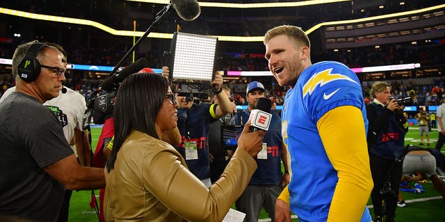 Oct 17, 2022; Inglewood, California, USA; Los Angeles Chargers place kicker Dustin Hopkins (6) is interviewed by sideline reporter Lisa Salters following the overtime victory against the Denver Broncos at SoFi Stadium.