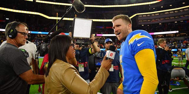 Oct 17, 2022; Inglewood, California, USA; Los Angeles Chargers place kicker Dustin Hopkins (6) is interviewed by sideline reporter Lisa Salters following the overtime victory against the Denver Broncos at SoFi Stadium.