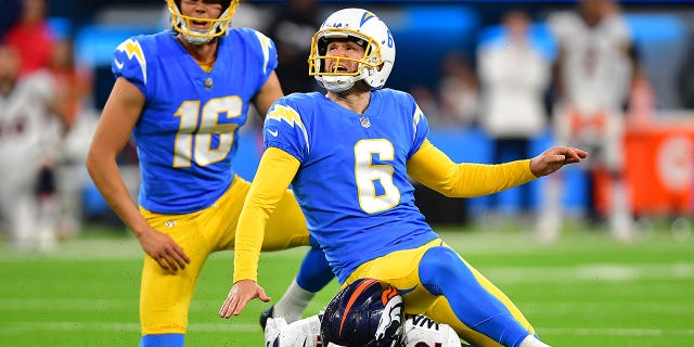 Oct 17, 2022; Inglewood, California, USA; Los Angeles Chargers place kicker Dustin Hopkins (6) kicks the game winning field goal against the Denver Broncos during overtime at SoFi Stadium.