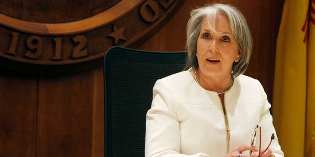 New Mexico Gov. Michelle Lujan Grisham signed a bill to overturn a state ban on abortion in time to ensure access after the U.S. Supreme Court struck down Roe vs. Wade in Santa Fe, N.M., on June 27, 2022.