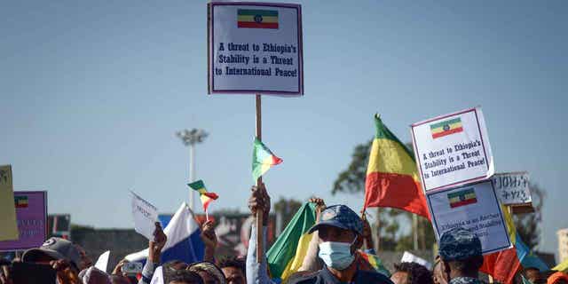 Ethiopians protest against what they say is interference by outsiders in the internal affairs of the country and the Tigray People's Liberation Front in a demonstration organized by the city administration in Addis Ababa, Ethiopia, on October 22, 2022.