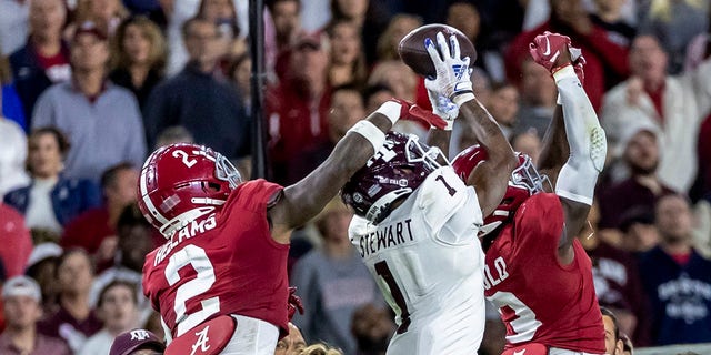 Texas wide receiver Evan Stewart grabs a pass against Alabama, Saturday, Oct. 8, 2022, in Tuscaloosa.