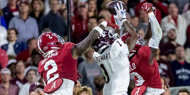 Texas wide receiver Evan Stewart grabs a pass against Alabama, Saturday, Oct. 8, 2022, in Tuscaloosa.