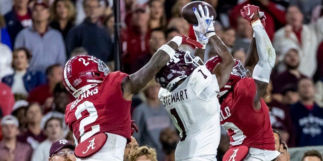 Texas wide receiver Evan Stewart grabs the pass against Alabama on Saturday, Oct. 8, 2022 in Tuscaloosa.