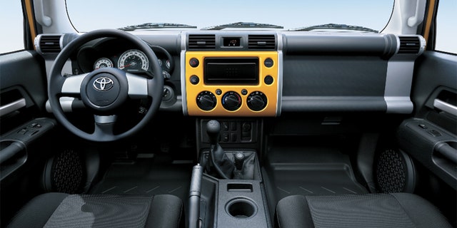 The FJ Cruiser's interior has not been updated with the latest touchscreen infotainment systems. 