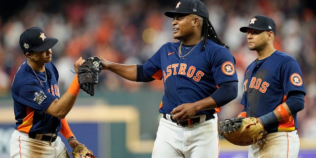 Astros starting pitcher Framber Valdez talks with Jeremy Pena, left, on the mound during the World Series game against the Philadelphia Phillies on Saturday, Oct. 29, 2022, in Houston.