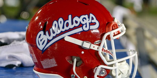 The Fresno State football program placed a coach on administrative leave after he punched and broke a glass window in the coach’s box, which injured fans.