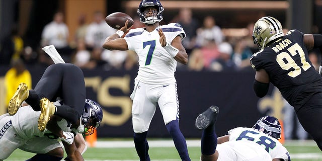 Seattle Seahawks quarterback Geno Smith passes during an NFL football game against the New Orleans Saints in New Orleans, Saturday, Oct. 8, 2022. 