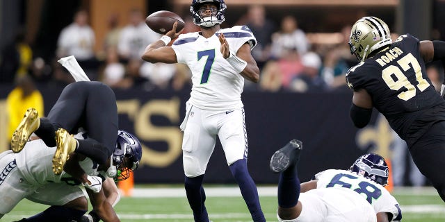 Seattle Seahawks quarterback Geno Smith passes during an NFL football game against the New Orleans Saints in New Orleans, Saturday, Oct. 8, 2022.