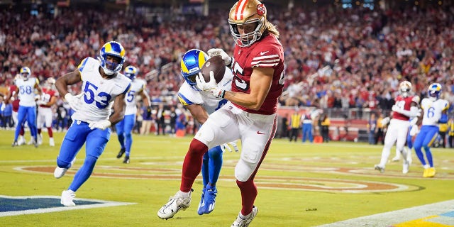 San Francisco 49ers tight end George Kittle, middle, cannot catch a pass in bounds during the second half of a game against the Los Angeles Rams in Santa Clara, Calif., Monday, Oct. 3, 2022. 