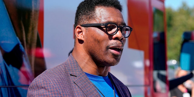 Georgia Republican Senate nominee Herschel Walker speaks during a campaign stop at Battle Lumber Co. on Thursday, Oct. 6, 2022, in Wadley, Georgia.