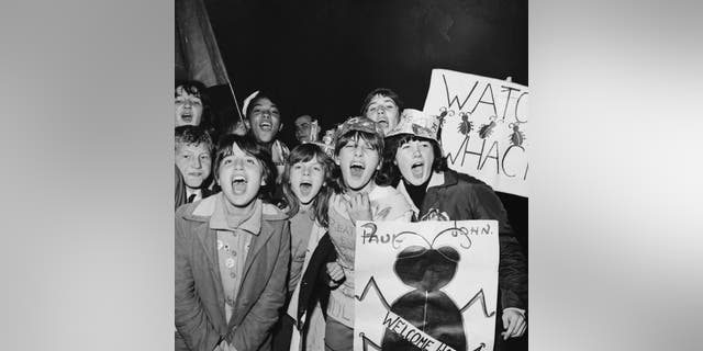 Screaming Beatles fans at Heathrow Airport in London in Sept. 1964.