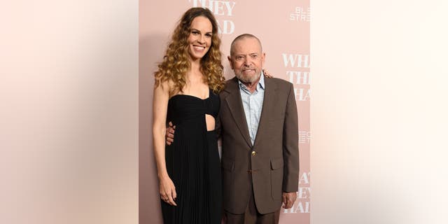Academy Award-winning actress Hilary Swank and her father, retired Air Force Chief Master Sgt. Stephen Michael Swank, are shown in 2018.