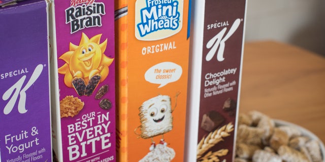 Boxes of Kellogg Co. Special K, Raisin Bran and Frosted Mini Wheats brand breakfast cereals are arranged.