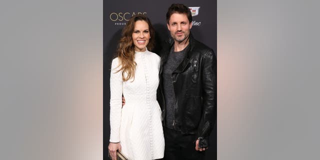 Hilary Swank first revealed that she was pregnant and expecting twins with her husband, Philip Schneider, during an appearance on "Good Morning America."