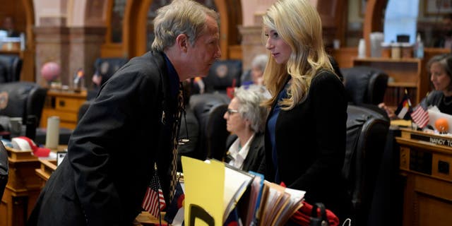 Senator Pete Lee, left, was indicted by a grand jury in August for allegedly falsifying the voting address he used to run for office.