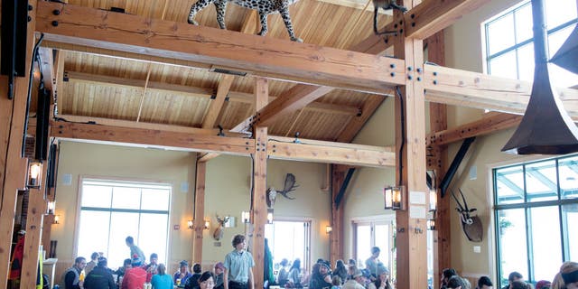 Skiers take a break at The Trapp Family Lodge beer hall on March 1, 2020, in Stowe, Vermont. The brewery boasts an Alpine beer hall vibe.