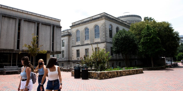 Students meander through the campus of the University of North Carolina at Chapel Hill