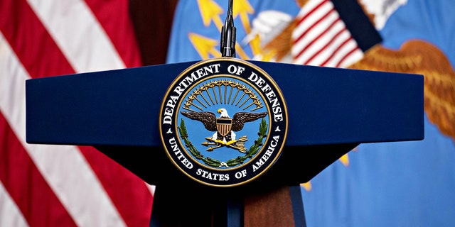 The U.S. Department of Defense seal in the Pentagon Briefing Room in Arlington, Virginia, on Wednesday, Sept. 1, 2021. President Biden yesterday declared an end to two decades of U.S. military operations in Afghanistan, offering an impassioned defense of his withdrawal and rejecting criticism that it was mishandled.