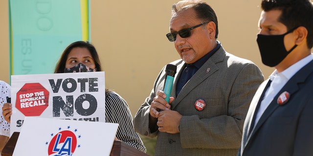 Federation of Labor President Ron Herrera, center, and several elected officials held a news conference and rally to urge Latinos to vote no in the recall effort against Democratic Gov. Gavin Newsom on Sept. 13, 2021, in Los Angeles, CA. 
