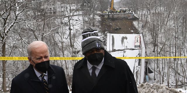 President Biden and Pittsburgh Mayor Ed Gainey visit the scene of the Forbes Avenue Bridge collapse over Fern Hollow Creek in Frick Park in Pittsburgh, Pennsylvania, on Jan. 28, 2022. (SAUL LOEB/AFP via Getty Images)