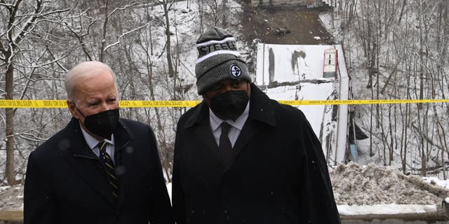 President Biden and Pittsburgh Mayor Ed Gainey visit the scene of the Forbes Avenue Bridge collapse over Fern Hollow Creek in Frick Park in Pittsburgh, Pennsylvania, on Jan. 28, 2022. (SAUL LOEB/AFP via Getty Images)