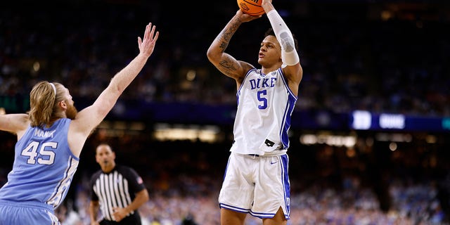 Paolo Banchero of the Duke Blue Devils puts up a shot against the North Carolina Tar Heels during the NCAA Men's Basketball Tournament Final Four semifinal on April 2, 2022, in New Orleans.