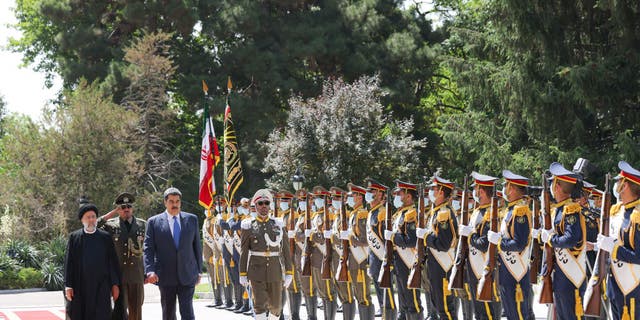 Iranian President Ebrahim Raisi welcomes Venezuelan President Nicolás Maduro to Sadabat Palace in Tehran, Iran on June 11, 2022.