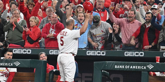 St. Louis Cardinals designated hitter Albert Pujols (5) gives the sold-out crowd a curtain call after hitting his 701st home run during a MLB game between the Pittsburgh Pirates and the St. Louis Cardinals, September 30, 2022, at Busch Stadium, St. Louis, MO. 